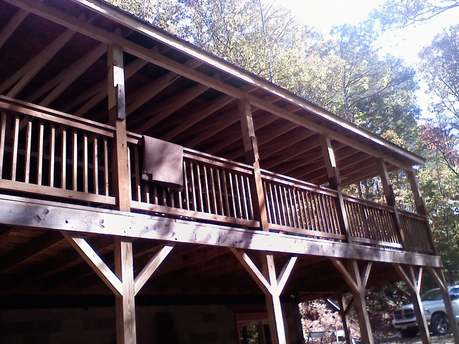 Timber framing under a new elevated porch and deck — Roof Leak Repair in Igo by Roofing Brothers